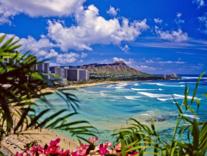 The iconic Waikiki Beach with Diamond Head in the background.