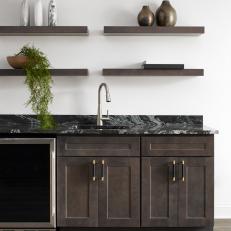 Kitchen With Black Marble Countertops