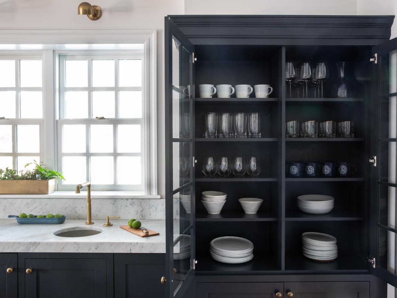 https://hgtvhome.sndimg.com/content/dam/images/hgtv/fullset/2022/3/8/4/CI_Wendy-Concannon_Mindy-Oconnor-West-Mermaid-china-cabinet.jpg.rend.hgtvcom.1280.960.suffix/1646797210912.jpeg