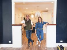 As seen on HGTV’s Renovation Goldmine, hosts Meg and Joe Piercy pose for a portrait in the home of Jen and Melanie Mihalek. (Working Day, Portrait)