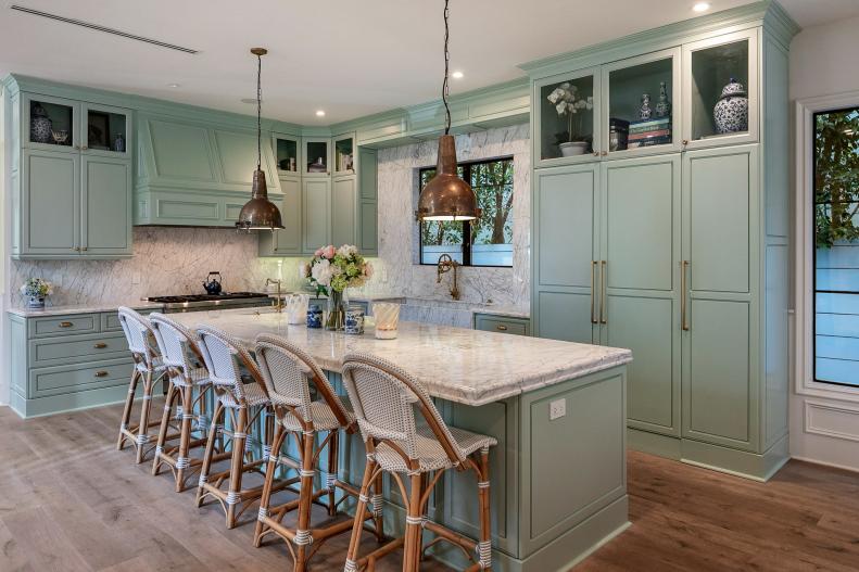 Green Cottage Kitchen With Wicker Stools