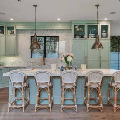 Green Cottage Chef Kitchen With White Barstools