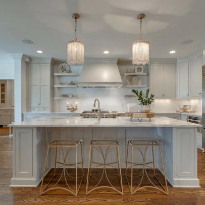White French Country Kitchen With Island and Elegant Gold Barstools 