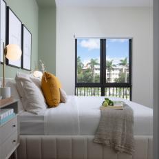 Transitional Bedroom With Green Accent Wall