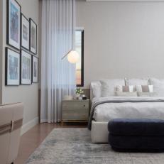 Gray Contemporary Bedroom With Blue Ottoman
