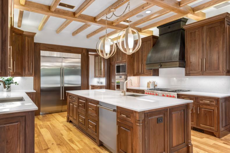 Rustic kitchen with hardwood upper and lower cabinets. 