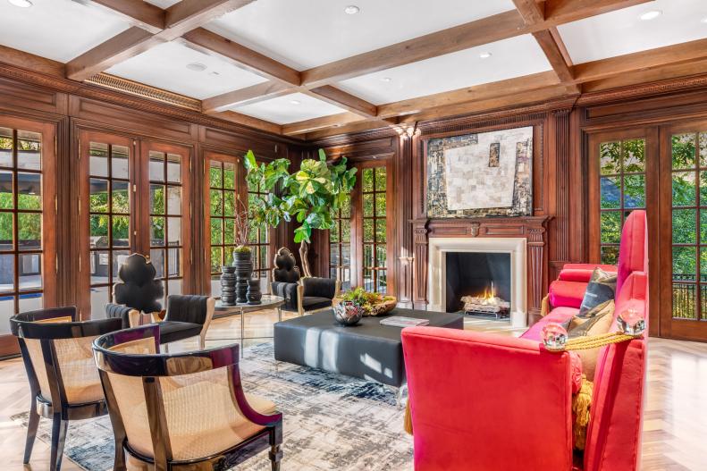 Paneled room with bright contemporary furniture. 