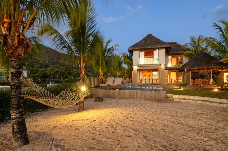 Hammock Between Palm Trees, Villa with Landscape Lighting in Yard