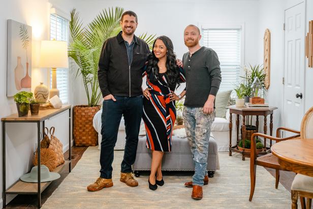 As seen on HGTV's Bargain Block, Keith Bynum, Shea Hicks-Whitfieldpose, and Evan Thomas pose in the living room of the Hampton House.