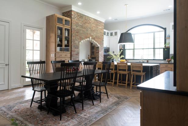 FAIRVIEW, TX - JUNE 3: The open concept dinning room and kitchen design is seen as host Jennifer Todryk prepares to reveal the rooms to the Anderson family after renovation, as seen on HGTV’s No Demo Reno.