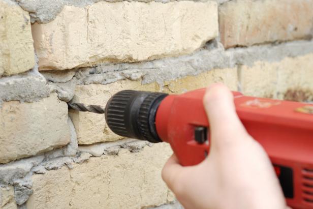 Drilling the brick wall