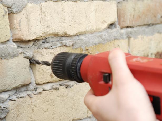 Tips for Drilling Into Brick or Concrete | HGTV