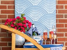 Does your patio, porch or deck have a case of the blahs? We'll show you how to easily stencil a plywood board to turn it into colorful outdoor art that can stand up to the elements.