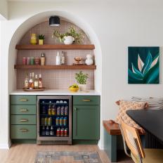 Inset Kitchen Bar With Tile Backsplash and Green Cabinets