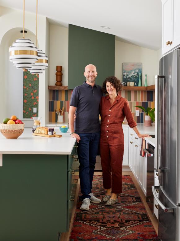 Colorful Kitchen With Tiled Backsplash and Green island