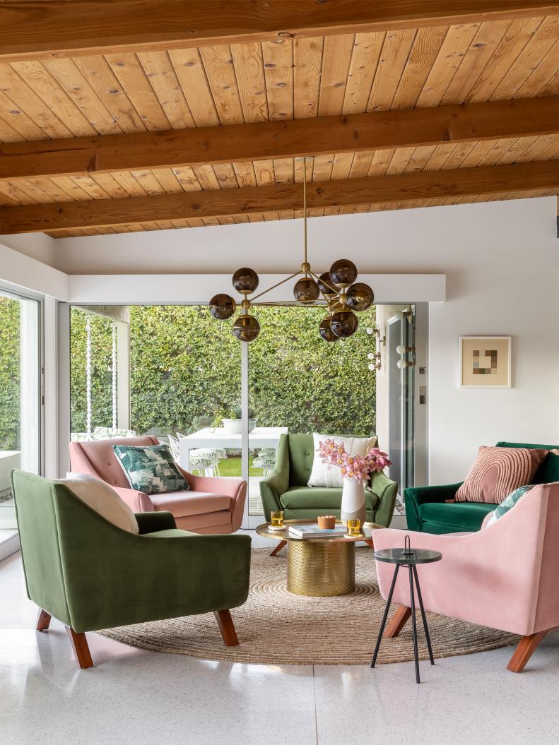 Midcentury Modern Sitting Room With Velvet Chairs and Jute Rug
