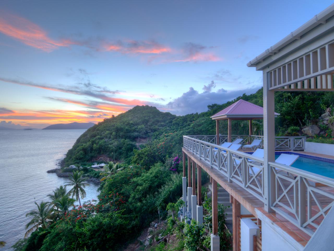 Secluded tropical retreat engulfed in lush gardens