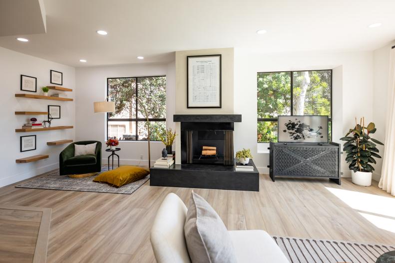 Lisa Kudrow, along with Drew and Jonathan Scott, reveal the renovated property including the living and dining areas, as well as the pet friendly patio to Lisa's cousin Thea Mann, as seen on Celebrity IOU.