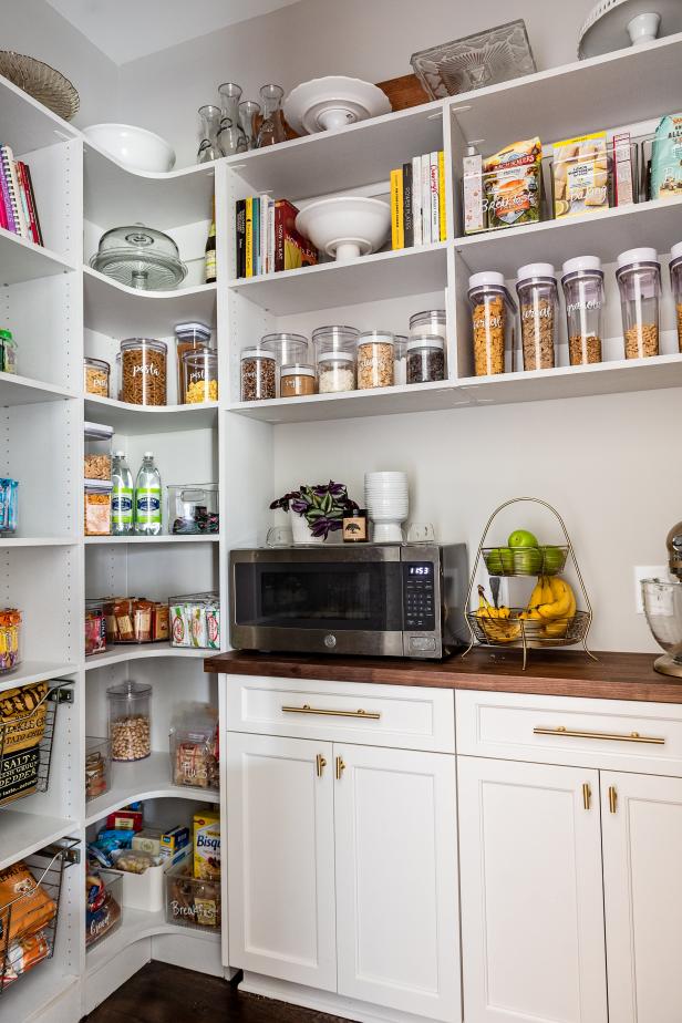 Organized Pantry With White Cabinets and Butcher Block Countertops | HGTV