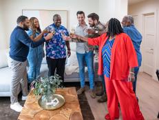 Anthony Anderson, along with Drew and Jonathan Scott, reveal the renovated home including the living room, dining room and kitchen to Anthony's brother Derrick, as seen on Celebrity IOU.