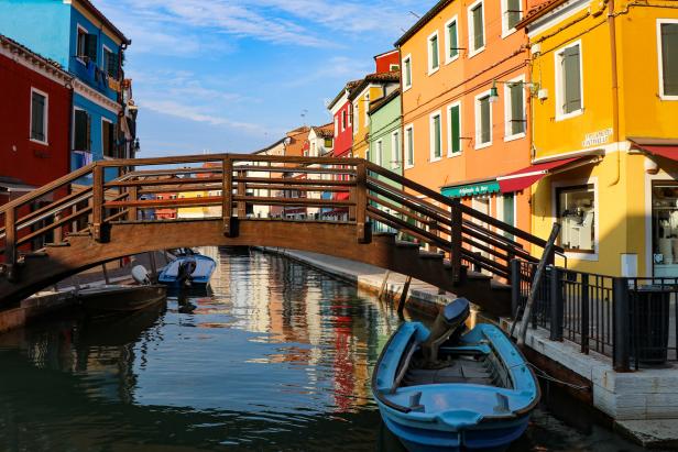 Colorful Houses And Bridge in Burano, Venice, Italy.
