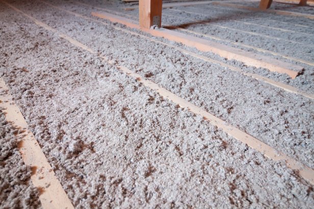 Ecowool insulation is poured in the attic. Eco-freandly clean