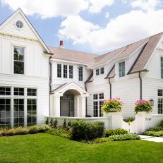 Traditional White Home With Large Lawn