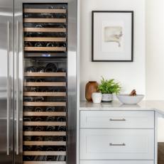 Transitional Kitchen Features Gray Tones and Wine Fridge