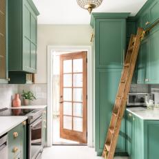 Green & White Galley Kitchen With Custom Mosaic Floor