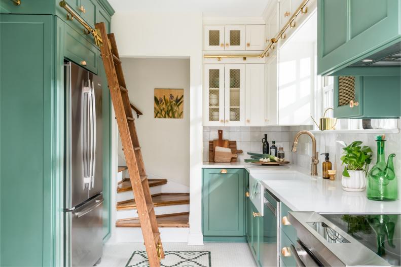 Green & White Galley Kitchen With Rolling Library Ladder