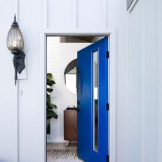 Midcentury Modern House Entrance With Welcoming Blue Door
