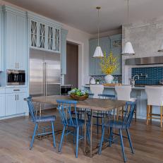 Contemporary Blue Kitchen With Wooden Dining Table
