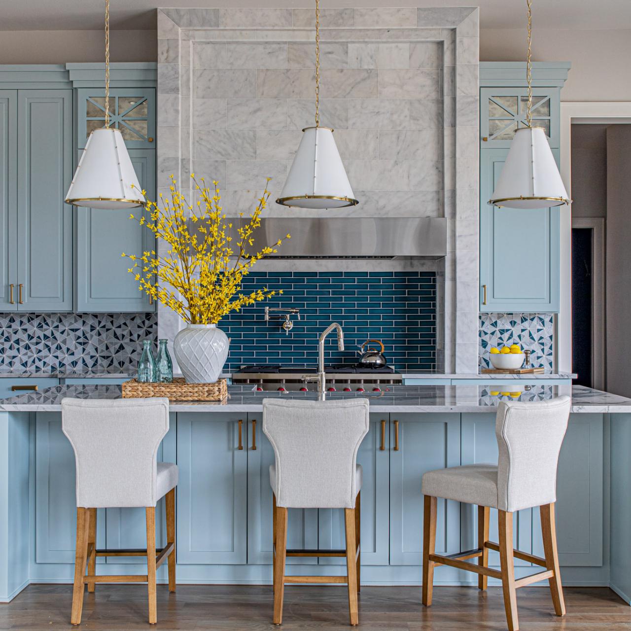 INTERIORS とじまと on X: YOU MAKE ME FEEL SO BLUE— Blue kitchen cabinet with  matching backsplash and terracotta tiles.  / X