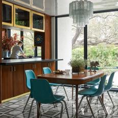 Midcentury Modern Dining Room With Blue Chairs