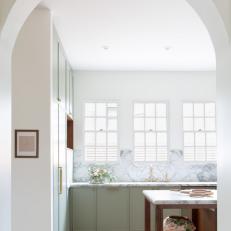 Contemporary Kitchen With Arched Door