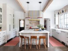 Neutral Transitional Open Plan Kitchen With Red Pendants