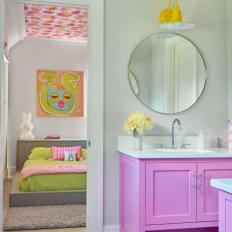 Pink Vanity in Bathroom Connected to Children's Bedroom
