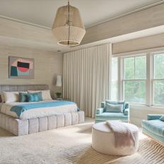 Neutral Toned Bedroom With Large Windows