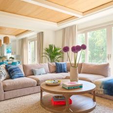 Open Concept Living Room and Kitchen With Wood Paneled Ceiling