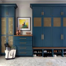 Closet With Blue Storage Cabinets