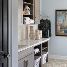 Neutral Laundry Room With Printed Tile Floor