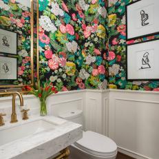 Bold Powder Room With Bright Floral and Black Wallpaper