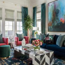 Jewel-Toned Living Room With Pink Velvet Armchairs