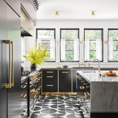 Modern Black and White Kitchen Lined With Windows