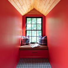 Red and Wood Reading Nook By Window