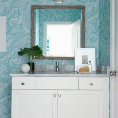 Coastal Bathroom With Decorative Blue Wallpaper Inspired by Italian Summer