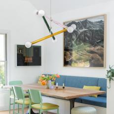 Blue and Green Dining Space With Banquette Sputnik Chandelier