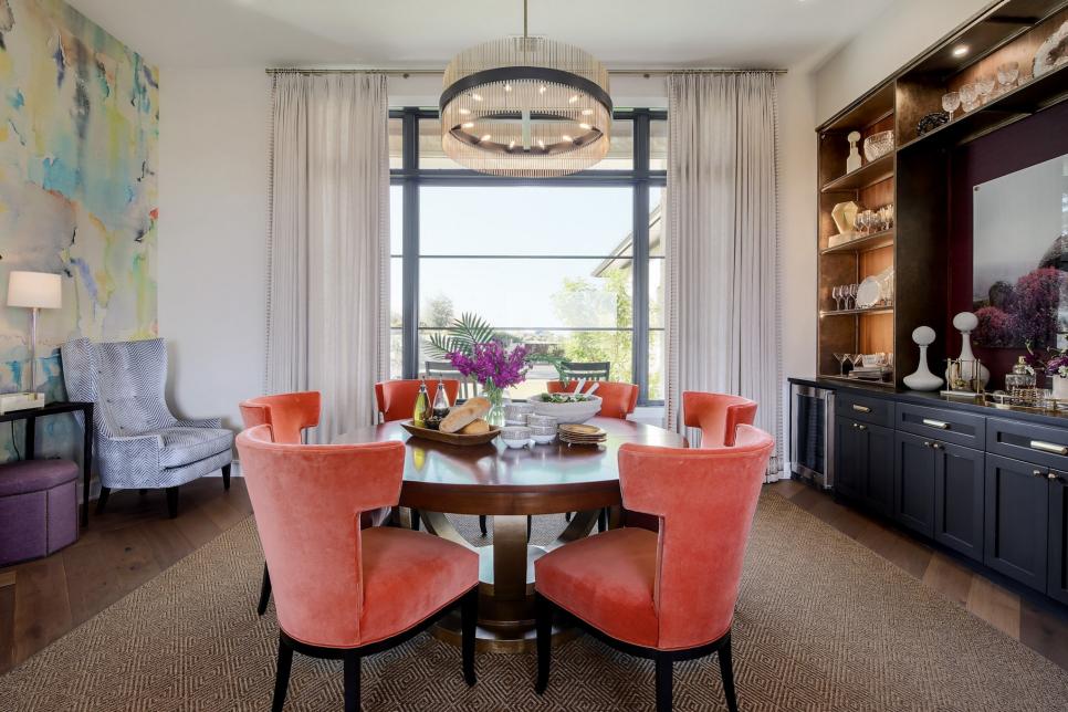Multicolored Dining Room With Orange Chairs