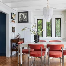 Transitional Dining Room With Red Accents