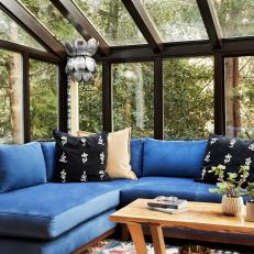 Transitional Sunroom With Blue Sectional